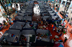 Evacuees at a temporary shelter in Marikina City, east of Manila, on Saturday. More than 100,000 have fled their homes across the Philippines